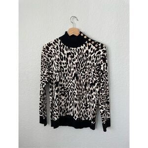Woman’s Calvin Klein Size S leopard  print sweater